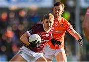 18 March 2023; Cian Hernon of Galway and Callum Cumiskey of Armagh during the Allianz Football League Division 1 match between Armagh and Galway at Box-It Athletic Grounds in Armagh. Photo by Ben McShane/Sportsfile