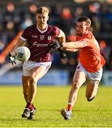 18 March 2023; Cian Hernon of Galway and Callum Cumiskey of Armagh during the Allianz Football League Division 1 match between Armagh and Galway at Box-It Athletic Grounds in Armagh. Photo by Ben McShane/Sportsfile