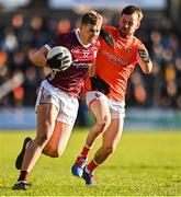 18 March 2023; Cian Hernon of Galway and Callum Cumiskey of Armagh during the Allianz Football League Division 1 match between Armagh and Galway at Box-It Athletic Grounds in Armagh. Photo by Ben McShane/Sportsfile