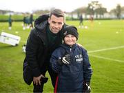 24 March 2023; The Republic of Ireland team granted the wish of 10-year-old Tyler Breen Somers, from Inchicore, Dublin, by welcoming him to training at the National Indoor Arena on the FAI National Training Centre in Abbotstown, Dublin. Tyler pictured with Republic of Ireland's Seamus Coleman, underwent a bone marrow transplant, 3 years ago, and has recovered from acute lymphoblastic leukaemia. His wish was aided by Make-A-Wish Ireland. Photo by Stephen McCarthy/Sportsfile