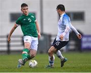 22 March 2023; Sean Grehan of Republic of Ireland in action against Viktor Úradník of Slovakia during the UEFA European Under-19 Championship Elite Round match between Republic of Ireland and Slovakia at Ferrycarrig Park in Wexford. Photo by Piaras Ó Mídheach/Sportsfile