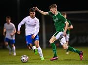 24 March 2023; Arran Healy of Republic of Ireland in action against Luke Salter of England during the Under-18 Schools Cententary Shield International match between Republic of Ireland and England at Athlone Town Stadium in Westmeath. Photo by Piaras Ó Mídheach/Sportsfile