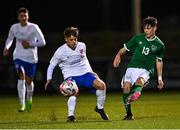 24 March 2023; Aidan Russell Vargas of Republic of Ireland in action against Rio Joisce of England during the Under-18 Schools Cententary Shield International match between Republic of Ireland and England at Athlone Town Stadium in Westmeath. Photo by Piaras Ó Mídheach/Sportsfile
