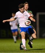 24 March 2023; Laiith Fairnie of England in action against Rhys Kelly Noonan of Republic of Ireland during the Under-18 Schools Cententary Shield International match between Republic of Ireland and England at Athlone Town Stadium in Westmeath. Photo by Piaras Ó Mídheach/Sportsfile