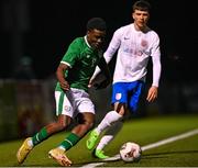 24 March 2023; Jonathan Adedeji of Republic of Ireland in action against Luke Salter of England during the Under-18 Schools Cententary Shield International match between Republic of Ireland and England at Athlone Town Stadium in Westmeath. Photo by Piaras Ó Mídheach/Sportsfile