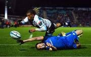 24 March 2023; Clayton Bloometjies of DHL Stormers dives over to score his side's third try despite the efforts of Dave Kearney of Leinster during the United Rugby Championship match between Leinster and DHL Stormers at the RDS Arena in Dublin. Photo by Tyler Miller/Sportsfile