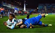 24 March 2023; Clayton Bloometjies of DHL Stormers dives over to score his side's third try despite the efforts of Dave Kearney of Leinster during the United Rugby Championship match between Leinster and DHL Stormers at the RDS Arena in Dublin. Photo by Tyler Miller/Sportsfile