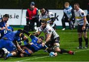 24 March 2023; Max Deegan of Leinster dives over to score his side's fourth try despite the tackle of Ruben van Heerden of DHL Stormers during the United Rugby Championship match between Leinster and DHL Stormers at the RDS Arena in Dublin. Photo by Stephen McCarthy/Sportsfile