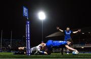 24 March 2023; Rob Russell of Leinster dives over to score his side's third try as teammate John McKee celebrates during the United Rugby Championship match between Leinster and DHL Stormers at the RDS Arena in Dublin. Photo by Harry Murphy/Sportsfile