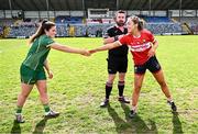 25 March 2023; Referee Seamus Mulvihill with captains Shauna Ennis of Meath and Sarah Leahy of Cork before the Lidl Ladies National Football League Division 1 Round 7 match between Cork and Meath at Pairc Ui Rinn in Cork. Photo by Eóin Noonan/Sportsfile