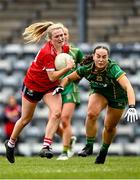 25 March 2023; Eimear Kiely of Cork in action against Olivia Gore of Meath during the Lidl Ladies National Football League Division 1 Round 7 match between Cork and Meath at Pairc Ui Rinn in Cork. Photo by Eóin Noonan/Sportsfile