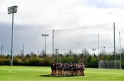 25 March 2023; St Ronan's College players huddle before the Lidl LGFA Post Primary Junior B Final match between Maynooth Educate Together, Kildare, and St Ronan's College Lurgan, Armagh, at the GAA National Games Development Centre in Abbotstown, Dublin. Photo by Ben McShane/Sportsfile