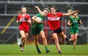 25 March 2023; Mary Kate Lynch of Meath in action against Ciara O'Sullivan of Cork during the Lidl Ladies National Football League Division 1 Round 7 match between Cork and Meath at Pairc Ui Rinn in Cork. Photo by Eóin Noonan/Sportsfile