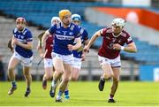 25 March 2023; Joseph Boyle of Westmeath in action against Padraig Delaney of Laois during the Allianz Hurling League Division 1 Relegation Play-Off match between Westmeath and Laois at FBD Semple Stadium in Thurles, Tipperary. Photo by Michael P Ryan/Sportsfile