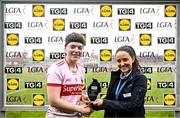 25 March 2023; Cork goalkeeper Sarah Murphy is presented with the Player of the Match award by Alison Meldrum, Store Manager, Lidl Midleton, after the Lidl Ladies National Football League Division 1 Round 7 match between Cork and Meath at Pairc Ui Rinn in Cork. Photo by Eóin Noonan/Sportsfile