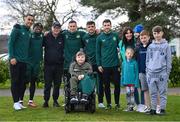 25 March 2023; Players, from left, Adam Idah, Chiedozie Ogbene, Alan Browne, Troy Parrott and Mikey Johnston meet Vincent Lyons, age 12, from Blanchardstown, and his family after a Republic of Ireland training session at the FAI National Training Centre in Abbotstown, Dublin. Photo by Stephen McCarthy/Sportsfile