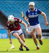 25 March 2023; Joseph Boyle of Westmeath in action against Ryan Mullaney of Laois during the Allianz Hurling League Division 1 Relegation Play-Off match between Westmeath and Laois at FBD Semple Stadium in Thurles, Tipperary. Photo by Michael P Ryan/Sportsfile