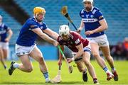 25 March 2023; Joseph Boyle of Westmeath is tackled by Padraig Delaney of Laois during the Allianz Hurling League Division 1 Relegation Play-Off match between Westmeath and Laois at FBD Semple Stadium in Thurles, Tipperary. Photo by Michael P Ryan/Sportsfile