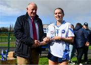 25 March 2023; Aoife Murnane of Maynooth in presented with the Player of the Match award by Pat Quill, representing the LGFA, after the Lidl LGFA Post Primary Junior B Final match between Maynooth Educate Together, Kildare, and St Ronan's College Lurgan, Armagh at the GAA National Games Development Centre in Abbotstown, Dublin. Photo by Ben McShane/Sportsfile