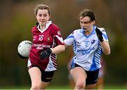 25 March 2023; Lauren McAlinden of St Ronan's College in action against Aoife O'Riain of Maynooth during the Lidl LGFA Post Primary Junior B Final match between Maynooth Educate Together, Kildare, and St Ronan's College Lurgan, Armagh, at the GAA National Games Development Centre in Abbotstown, Dublin. Photo by Ben McShane/Sportsfile