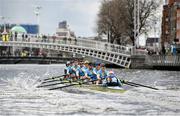 25 March 2023; The UCD team, from front to back, Shauna Fitzsimons (Cox), Fintan Earley, Sam Daly, David Somers, Paul Flood, Luke Dunleavy, Mika Ryan, Mikey Campion and David Crooks on their way to winning the Colours Boat Race between UCD and Trinity College on the River Liffey in Dublin. Photo by David Fitzgerald/Sportsfile