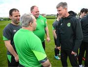 25 March 2023; Members of the Special Olympics Ireland Football Team speak to manager Stephen Kenny during a visit to a Republic of Ireland training session, held at the FAI National Training Centre in Abbotstown, Dublin, ahead of the Special Olympics World Games being held in Berlin, From 17 to 25 June 2023. Photo by Stephen McCarthy/Sportsfile