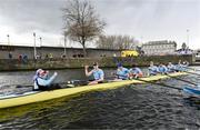 25 March 2023; The UCD team, from front to back, Shauna Fitzsimons (Cox), Fintan Earley, Sam Daly, David Somers, Paul Flood, Luke Dunleavy, Mika Ryan, Mikey Campion and David Crooks celebrate after winning the Colours Boat Race between UCD and Trinity College on the River Liffey in Dublin. Photo by David Fitzgerald/Sportsfile