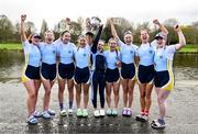 25 March 2023; The UCD Senior Girls team, from left, Alison Daly, Dervla O'Brien, Lauryn Roche, Ellie Scott, Orla Kelly, Niamh Campbell, Tara Phelan, Aisling Barry and Sarah Daly celebrate after winning the Senior Girls Colours Boat Race between UCD and Trinity College on the River Liffey in Dublin. Photo by David Fitzgerald/Sportsfile