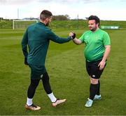 25 March 2023; Omer Teko of the Special Olympics Ireland Football Team with Matt Doherty during a visit to a Republic of Ireland training session, held at the FAI National Training Centre in Abbotstown, Dublin, ahead of the Special Olympics World Games being held in Berlin, From 17 to 25 June 2023. Photo by Stephen McCarthy/Sportsfile