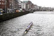 25 March 2023; The UCD team compete during the Senior Girls Colours Boat Race between UCD and Trinity College on the River Liffey in Dublin. Photo by David Fitzgerald/Sportsfile