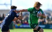 25 March 2023; Cian Prendergast of Connacht holds off the tackle of Stuart McInally of Edinburgh Rugby during the United Rugby Championship match between Connacht and Edinburgh at the Sportsground in Galway. Photo by Brendan Moran/Sportsfile