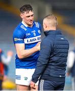 25 March 2023; Patrick Purcell of Laois with Westmeath manager Joe Fortune after the Allianz Hurling League Division 1 Relegation Play-Off match between Westmeath and Laois at FBD Semple Stadium in Thurles, Tipperary. Photo by Michael P Ryan/Sportsfile