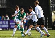 25 March 2023; Mark O'Mahony of Republic of Ireland has a shot on goal despite the attentions of Kristofer Käit, centre, and Robin Kane of Estonia during the UEFA European Under-19 Championship Elite Round match between Republic of Ireland and Estonia at Ferrycarrig Park in Wexford. Photo by Sam Barnes/Sportsfile