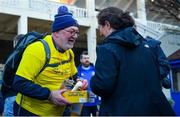24 March 2023; A Leinster supporter donates to the Irish Cancer Society at the United Rugby Championship match between Leinster and DHL Stormers at the RDS Arena in Dublin. Photo by Tyler Miller/Sportsfile