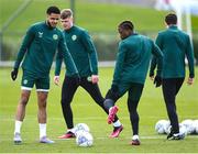 25 March 2023; Players, from left, Andrew Omobamidele, Evan Ferguson, Michael Obafemi and Mikey Johnston during a Republic of Ireland training session at the FAI National Training Centre in Abbotstown, Dublin. Photo by Stephen McCarthy/Sportsfile
