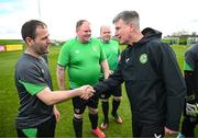 25 March 2023; Sean Murphy of the Special Olympics Ireland Football Team meets manager Stephen Kenny during a visit to a Republic of Ireland training session, held at the FAI National Training Centre in Abbotstown, Dublin, ahead of the Special Olympics World Games being held in Berlin, From 17 to 25 June 2023. Photo by Stephen McCarthy/Sportsfile