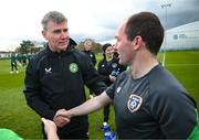 25 March 2023; Members of the Special Olympics Ireland Football Team with manager Stephen Kenny during a visit to a Republic of Ireland training session, held at the FAI National Training Centre in Abbotstown, Dublin, ahead of the Special Olympics World Games being held in Berlin, From 17 to 25 June 2023. Photo by Stephen McCarthy/Sportsfile