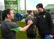 25 March 2023; Sean Murphy of the Special Olympics Ireland Football Team meets coach John O'Shea during a visit to a Republic of Ireland training session, held at the FAI National Training Centre in Abbotstown, Dublin, ahead of the Special Olympics World Games being held in Berlin, From 17 to 25 June 2023. Photo by Stephen McCarthy/Sportsfile