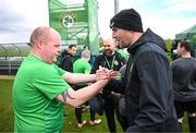 25 March 2023; Stephen O'Leary of the Special Olympics Ireland Football Team meets coach John O'Shea during a visit to a Republic of Ireland training session, held at the FAI National Training Centre in Abbotstown, Dublin, ahead of the Special Olympics World Games being held in Berlin, From 17 to 25 June 2023. Photo by Stephen McCarthy/Sportsfile