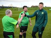 25 March 2023; Henry Cloran, left, and Omer Teko of the Special Olympics Ireland Football Team meets Matt Doherty during a visit to a Republic of Ireland training session, held at the FAI National Training Centre in Abbotstown, Dublin, ahead of the Special Olympics World Games being held in Berlin, From 17 to 25 June 2023. Photo by Stephen McCarthy/Sportsfile