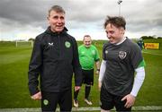 25 March 2023; Eamon Quinn of the Special Olympics Ireland Football Team with manager Stephen Kenny during a visit to a Republic of Ireland training session, held at the FAI National Training Centre in Abbotstown, Dublin, ahead of the Special Olympics World Games being held in Berlin, From 17 to 25 June 2023. Photo by Stephen McCarthy/Sportsfile