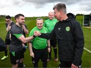 25 March 2023; James Meenan of the Special Olympics Ireland Football Team meets manager Stephen Kenny during a visit to a Republic of Ireland training session, held at the FAI National Training Centre in Abbotstown, Dublin, ahead of the Special Olympics World Games being held in Berlin, From 17 to 25 June 2023. Photo by Stephen McCarthy/Sportsfile