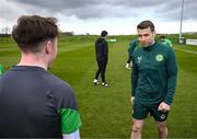 25 March 2023; Eamon Quinn of the Special Olympics Ireland Football Team with Seamus Coleman during a visit to a Republic of Ireland training session, held at the FAI National Training Centre in Abbotstown, Dublin, ahead of the Special Olympics World Games being held in Berlin, From 17 to 25 June 2023. Photo by Stephen McCarthy/Sportsfile