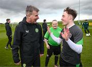 25 March 2023; Eamon Quinn of the Special Olympics Ireland Football Team with manager Stephen Kenny during a visit to a Republic of Ireland training session, held at the FAI National Training Centre in Abbotstown, Dublin, ahead of the Special Olympics World Games being held in Berlin, From 17 to 25 June 2023. Photo by Stephen McCarthy/Sportsfile