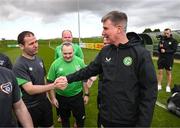 25 March 2023; Sean Murphy of the Special Olympics Ireland Football Team meets manager Stephen Kenny during a visit to a Republic of Ireland training session, held at the FAI National Training Centre in Abbotstown, Dublin, ahead of the Special Olympics World Games being held in Berlin, From 17 to 25 June 2023. Photo by Stephen McCarthy/Sportsfile