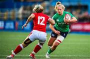 25 March 2023; Dannah O'Brien of Ireland is tackled by Kerin Lake of Wales during the TikTok Women's Six Nations Rugby Championship match between Wales and Ireland at Cardiff Arms Park in Cardiff, Wales. Photo by Mark Lewis/Sportsfile