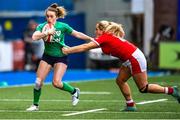25 March 2023; Molly Scuffil-Mccabe of Ireland is tackled by Courtney Keight of Wales during the TikTok Women's Six Nations Rugby Championship match between Wales and Ireland at Cardiff Arms Park in Cardiff, Wales. Photo by Mark Lewis/Sportsfile