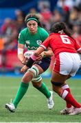 25 March 2023; Nichola Fryday of Ireland is tackled by Georgia Evans of Wales during the TikTok Women's Six Nations Rugby Championship match between Wales and Ireland at Cardiff Arms Park in Cardiff, Wales. Photo by Mark Lewis/Sportsfile