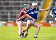 25 March 2023; Ryan Mullaney of Laois in action against Niall O'Brien of Westmeath during the Allianz Hurling League Division 1 Relegation Play-Off match between Westmeath and Laois at FBD Semple Stadium in Thurles, Tipperary. Photo by Michael P Ryan/Sportsfile