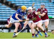 25 March 2023; James Keyes of Laois in action against Killian Doyle of Westmeath during the Allianz Hurling League Division 1 Relegation Play-Off match between Westmeath and Laois at FBD Semple Stadium in Thurles, Tipperary. Photo by Michael P Ryan/Sportsfile